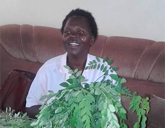 Woman holding plants