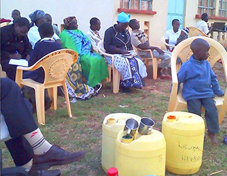 community sitting together outside