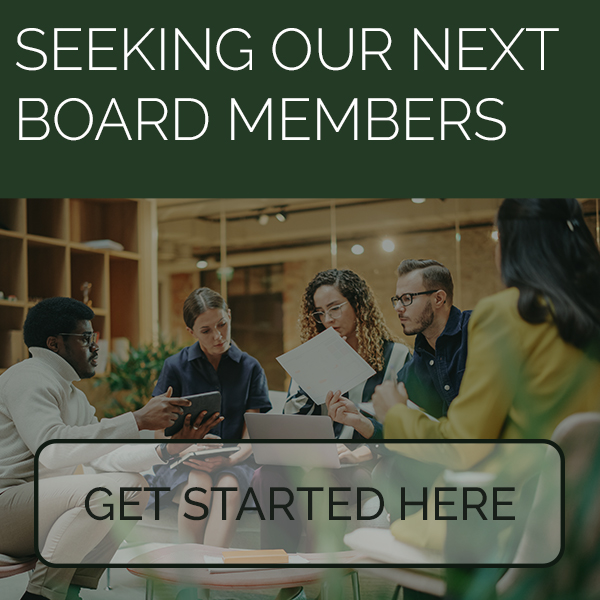 Seeking Board Members with a few people sitting around a table